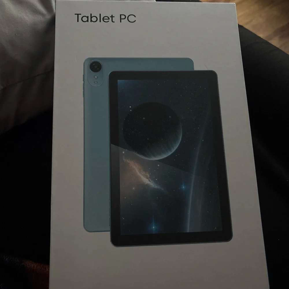 Sleek Blue Tablet with Cosmic Display and Modern Design